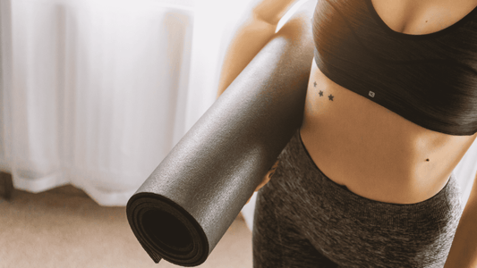 Woman holding foam roller